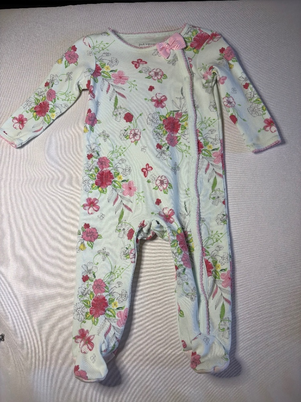 First Impressions one piece footy floral size 6 to 9 months